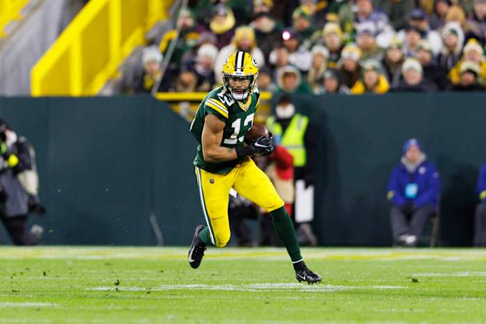 WR Allen Lazard runs after the catch in a 2022 game vs. the Cowboys
